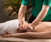 Close-up of physical therapist doing medical massage-1